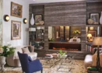 Salon avec cheminée et mobilier Maison Boissière BARNES Residences à Paris